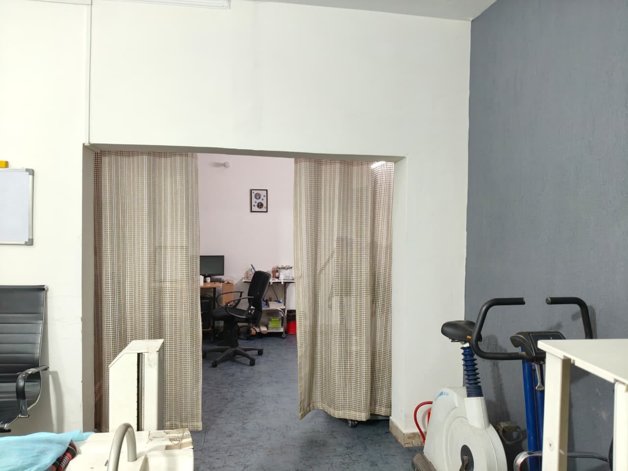 Gamma camera room with curtained control area at Uchit Diagnostic